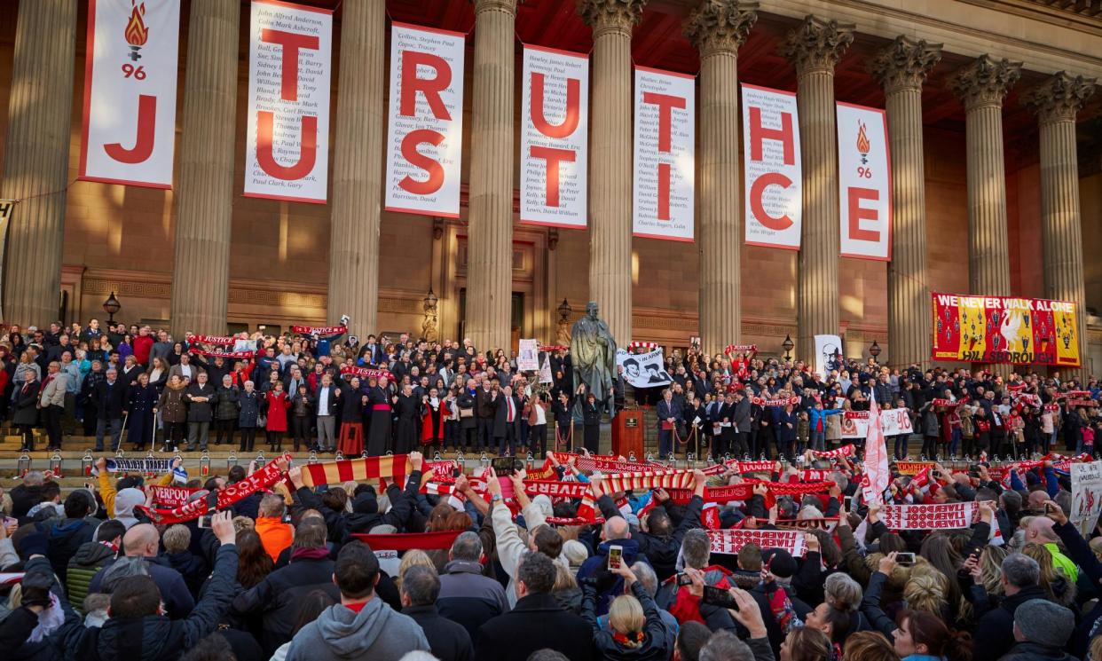 <span>A candlelit vigil outside St George’s Hall in Liverpool, the day after an inquest delivered the verdict of unlawful killing.</span><span>Photograph: Christopher Thomond/The Guardian</span>