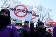 FILE PHOTO: Federal air traffic controller union members protest the partial U.S. federal government shutdown in a rally at the U.S. Capitol in Washington, U.S. Jan. 10, 2019. REUTERS/Jonathan Ernst/File Photo