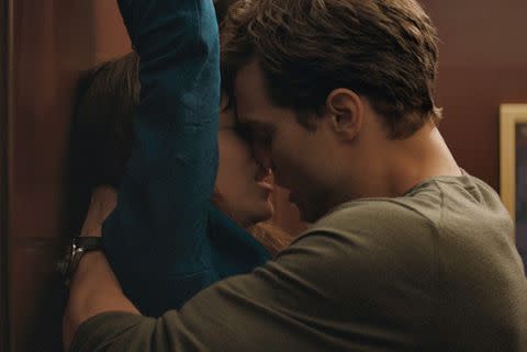 Christian Grey and Anastasia get...close in <i>Fifty Shades of Grey</i>. Photo: Universal Pictures