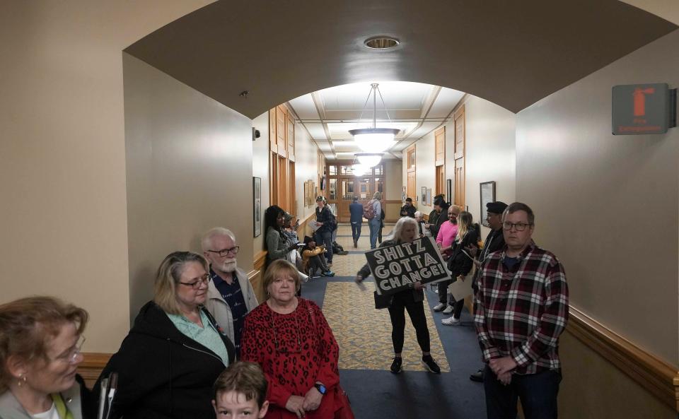 Members of the public wait to speak to the Fire and Police Commission about the video release policy Thursday at City Hall in Milwaukee.