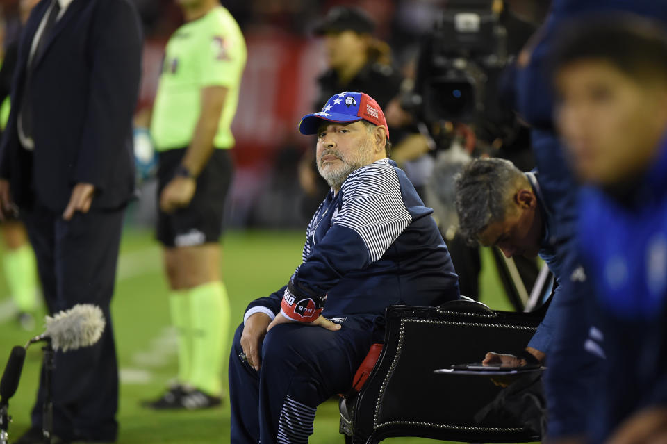 Diego Maradona managed Tuesday's Gimnasia game vs. Newell's Old Boys from an armchair. (Getty)