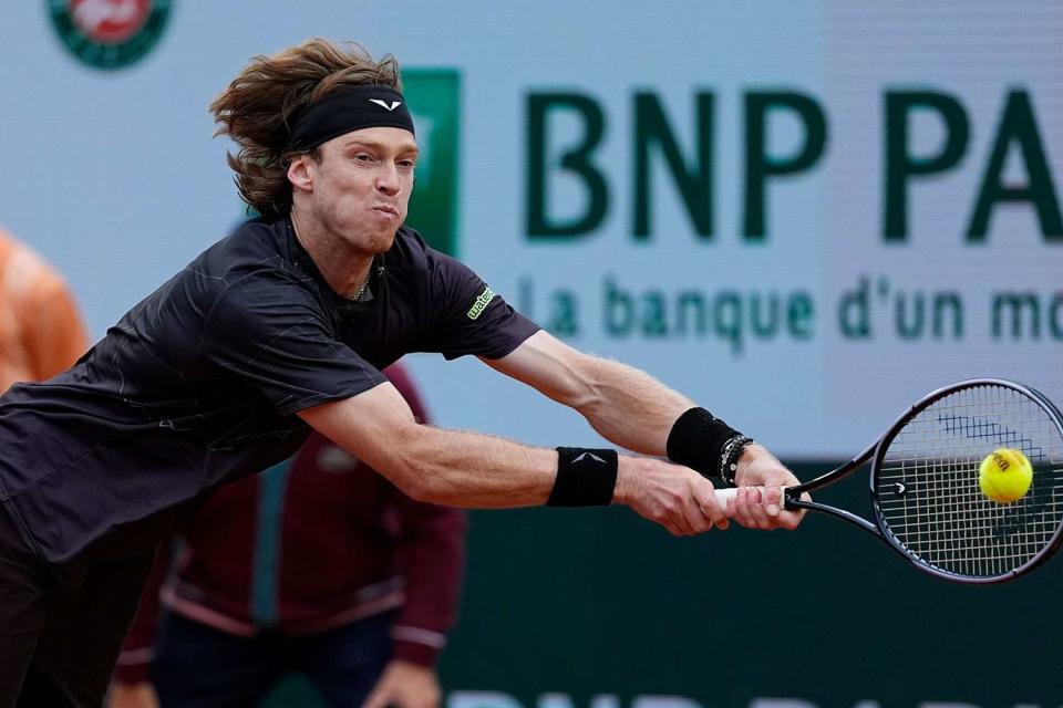 <p>Glenn Gervot/Icon Sportswire via Getty</p>  Andrey Rublev at Roland Garros Stadium on May 31, 2024 in Paris, France.