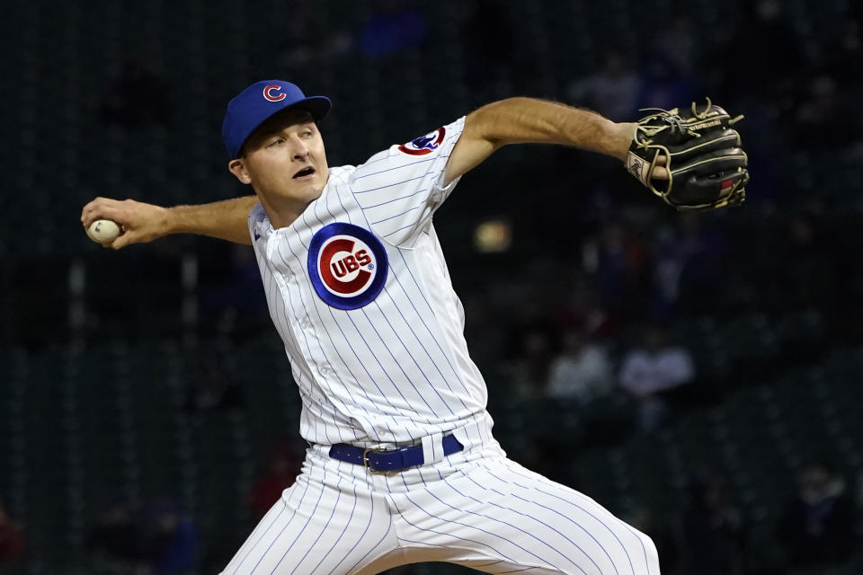 Chicago Cubs starting pitcher Hayden Wesneski winds up during the first inning of a baseball game against the Philadelphia Phillies Wednesday, Sept. 28, 2022, in Chicago. (AP Photo/Charles Rex Arbogast)