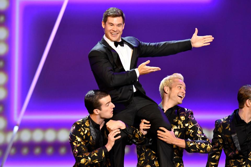 Adam DeVine performs on stage during the 71st Emmy Awards.