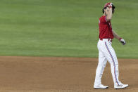 Texas Rangers' Charlie Culberson reacts after hitting a popout to end the eighth inning of a baseball game against the Minnesota Twins in Arlington, Texas, Friday, June 18, 2021. (AP Photo/Andy Jacobsohn)