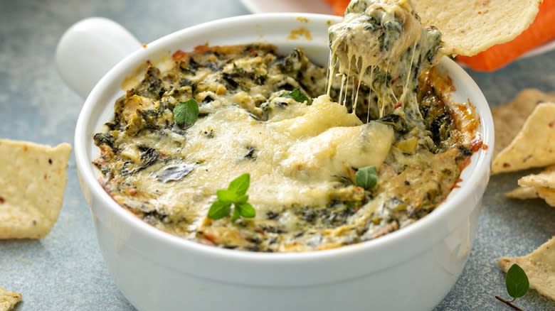 Cheesy creamed spinach with tortilla chip