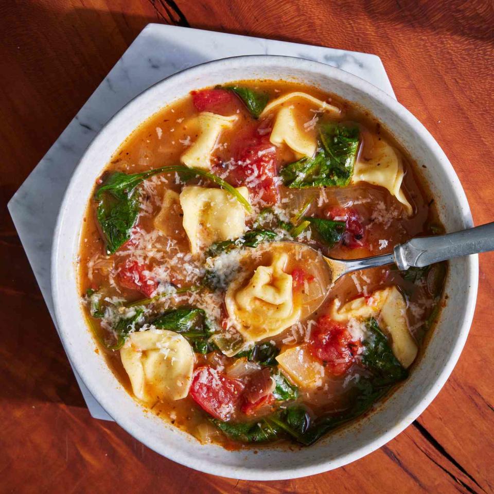 <p>When you need a quick and flavorful dinner, turn to this easy tortellini soup with spinach. Refrigerated cheese tortellini bulk up the soup and cook in just minutes. The tortellini can be delicate, so be careful when stirring the soup to avoid them falling apart. <a href="https://www.eatingwell.com/recipe/8019618/spinach-tortellini-soup/" rel="nofollow noopener" target="_blank" data-ylk="slk:View Recipe;elm:context_link;itc:0;sec:content-canvas" class="link ">View Recipe</a></p>