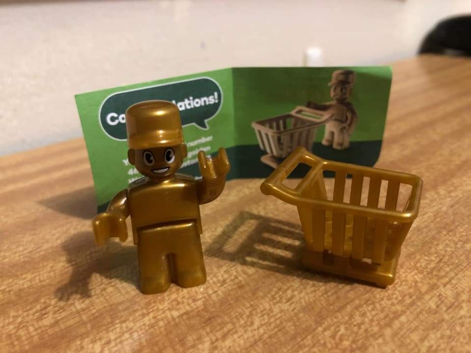 Woolworths golden Lego man with trolley. Source: Facebook