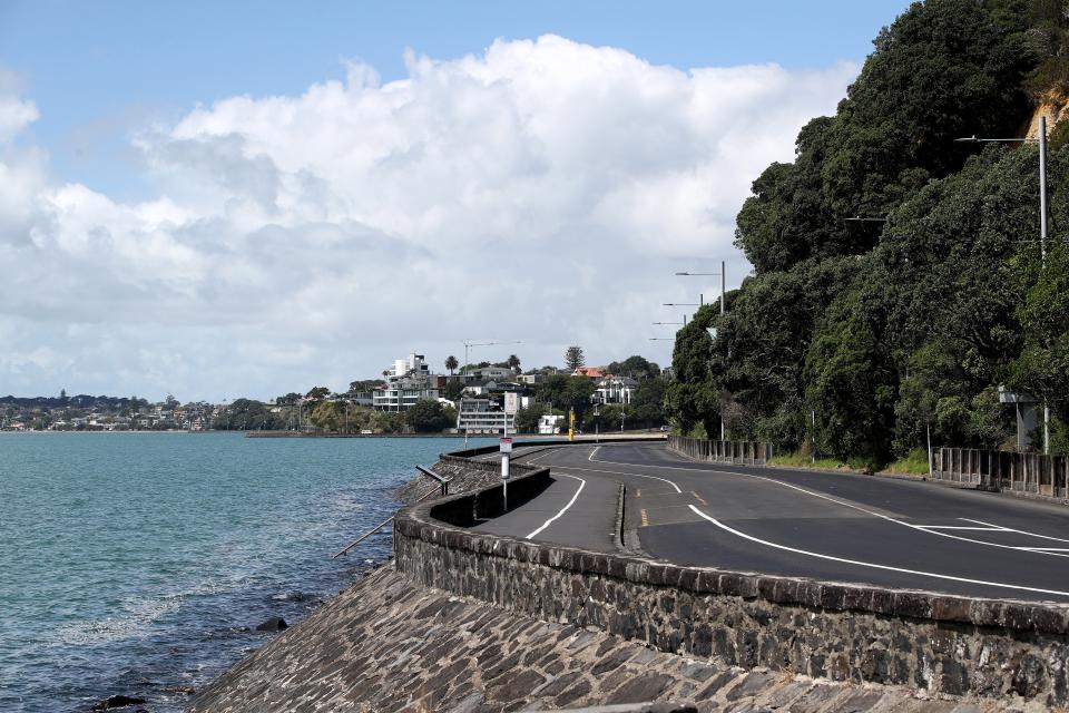 <p>Tamaki Drive is shown empty of cars and people due to a tsunami warning following a series of earthquakes on 5 March, 2021, in Auckland, New Zealand</p> (Getty Images)