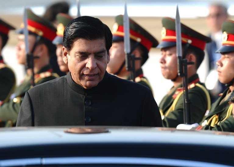 Pakistan's Prime Minister Raja Ashraf, pictured at Wattay airport in Laos on November 4, 2012. Pakistan's top judge has ordered the arrest of the prime minister over alleged corruption in power projects, a move which could worsen the country's political turmoil