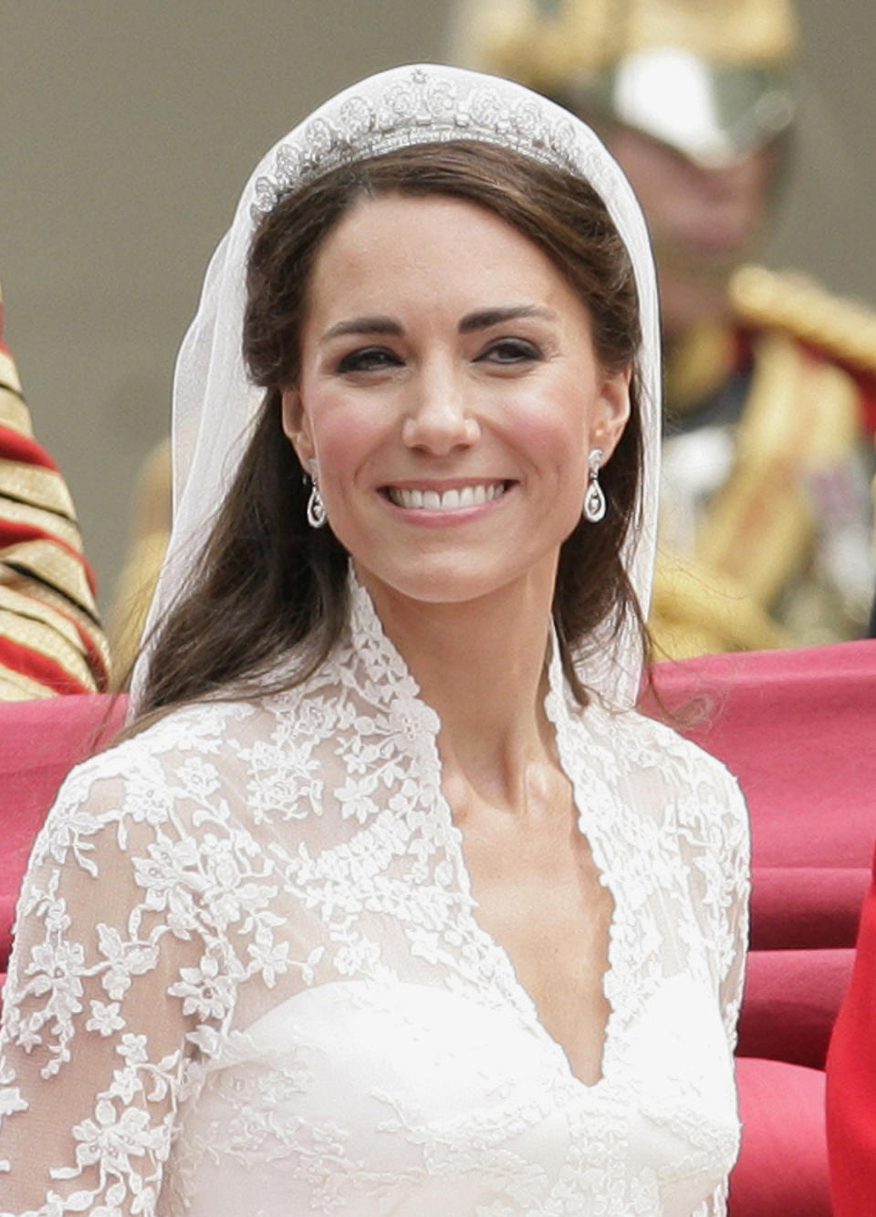 Catherine, Duchess of Cambridge travels down The Mall on route to Buckingham Palace in a horse drawn carriage following her wedding at Westminster Abbey on April 29, 2011 in London, England