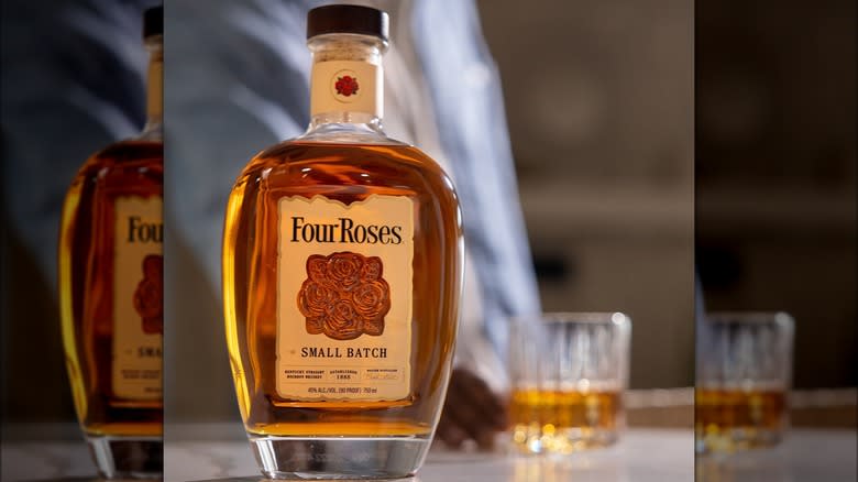 Four Roses bourbon bottle on table