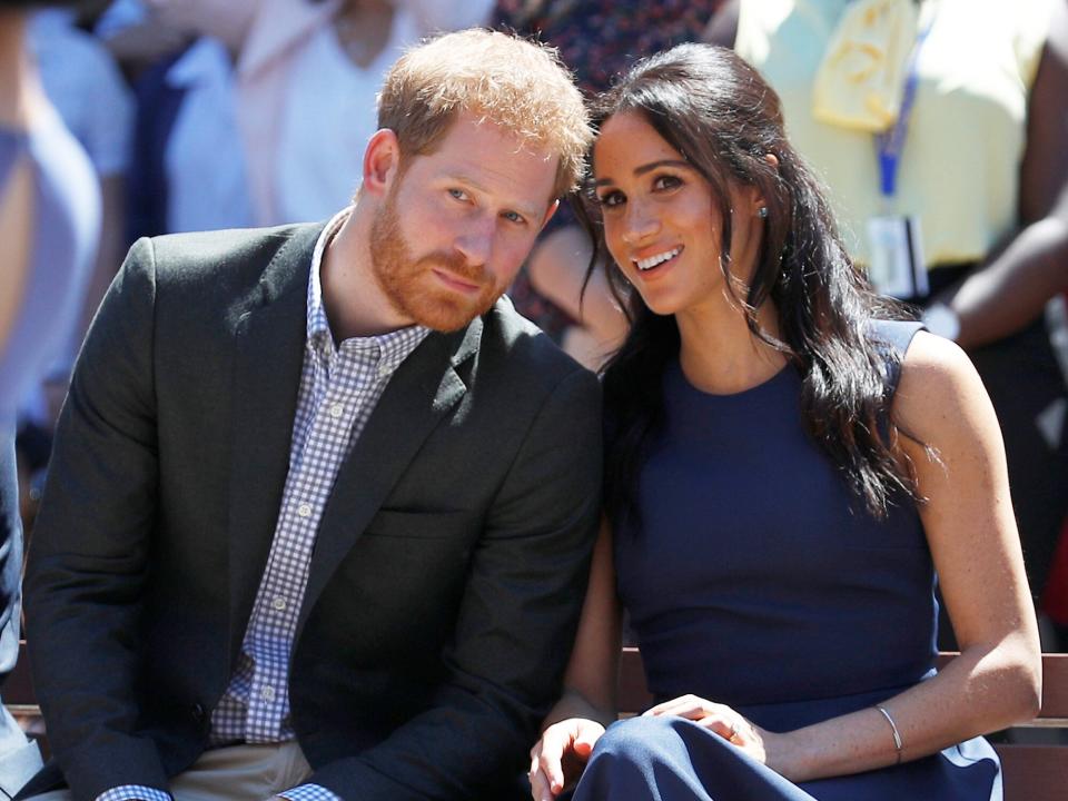 Prince Harry, Duke of Sussex and Meghan, Duchess of Sussex watch a performance during their visit to Macarthur Girls High School on October 19, 2018 in Sydney, Australia. The Duke and Duchess of Sussex are on their official 16-day Autumn tour visiting cities in Australia, Fiji, Tonga and New Zealand