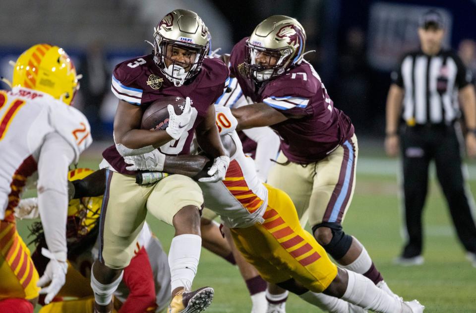 Michigan Panthers running back Reggie Corbin runs the ball on the final drive against the Philadelphia Stars during the second half at Protective Stadium in Birmingham, Alabama, May 6, 2022.