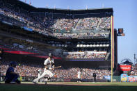 San Francisco Giants' Steven Duggar hits a two-run triple against the Los Angeles Dodgers during the second inning of a baseball game in San Francisco, Sunday, Sept. 5, 2021. (AP Photo/Jeff Chiu)