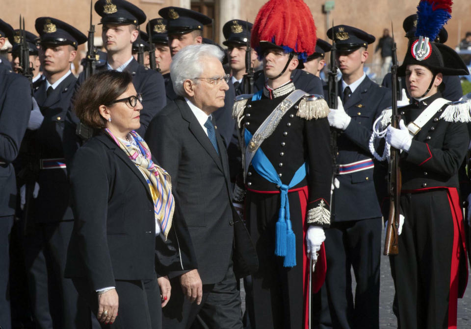 Italian President Sergio Mattarella, right, and Italian Defence Minister Elisabetta Trenta review a honor guard as they visit the memorial to the Unknown Soldier in Rome, Thursday, April 25, 2019. Italian leaders are holding observances on Liberation Day, which celebrates the end of the country’s fascist dictatorship during World War II, with appeals against glorifying dictator Benito Mussolini. (Claudio Peri/ANSA via AP)