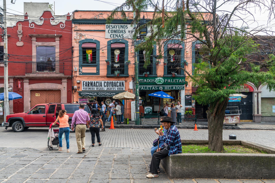 People outside a taqueria in Mexico City.