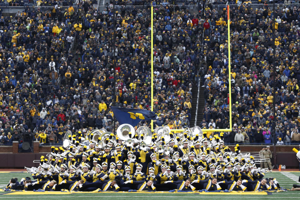 Maggie St. Clair, the Michigan marching band’s director of operations, died suddenly on Saturday morning just before the Wolverines’ game against Ohio State. (AP Photo/Paul Sancya)