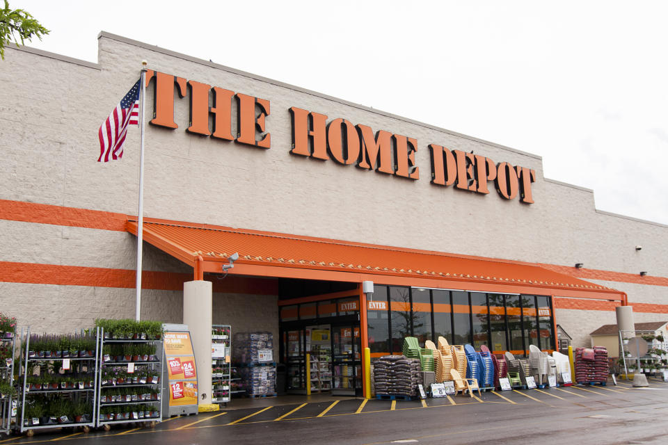 Mount Prospect, IL, USA - May 29, 2011: Entrance of The Home Depot home improvement store in Mount Prospect, IL, a suburb of Chicago.  Plants and chairs for sale are displayed in front of store.