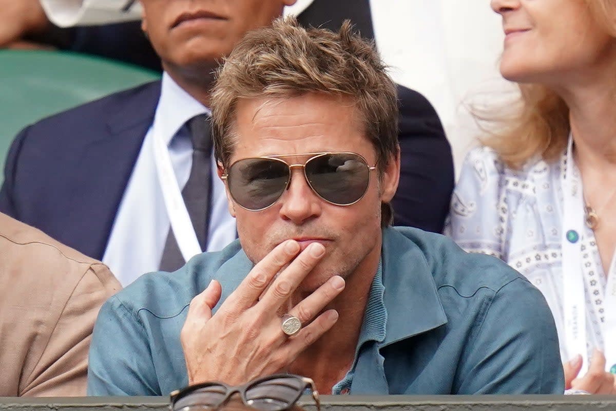 Brad Pitt was among a host of celebrities watching the men’s singles final on Sunday  (PA Wire)