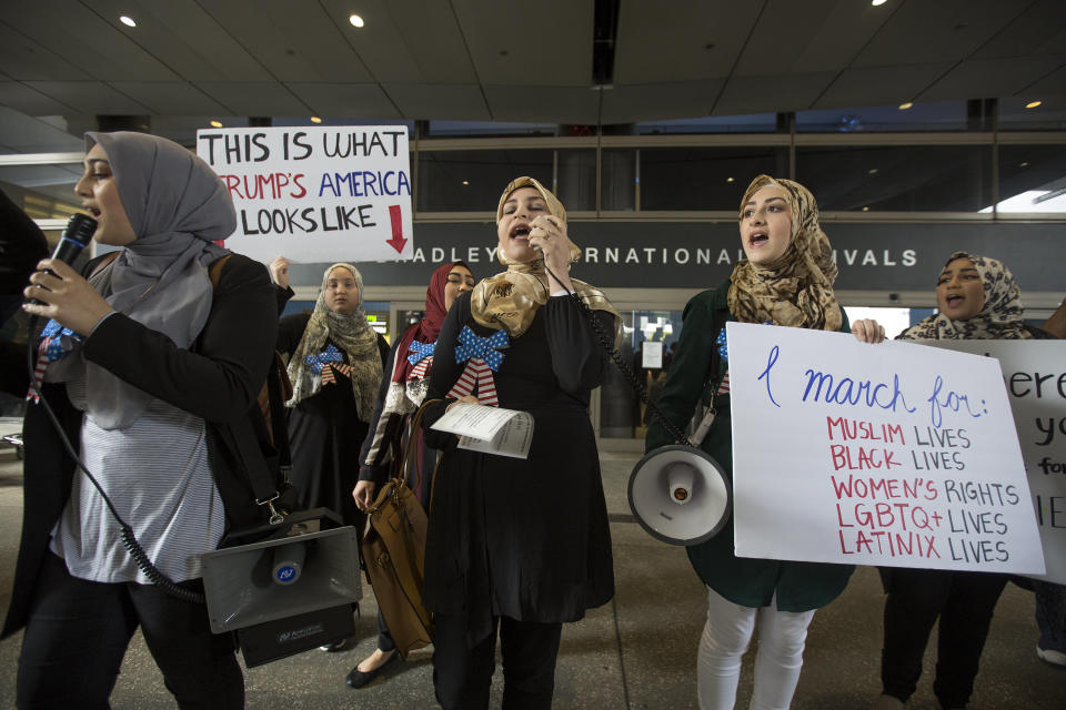 Women demonstrate in support of a ruling by a federal judge in Seattle that granted a nationwide temporary restraining order against President Donald Trump's ban on travel to the United States from seven Muslim-majority countries, at Tom Bradley International Terminal at Los Angeles International Airport on Feb. 4, 2017.