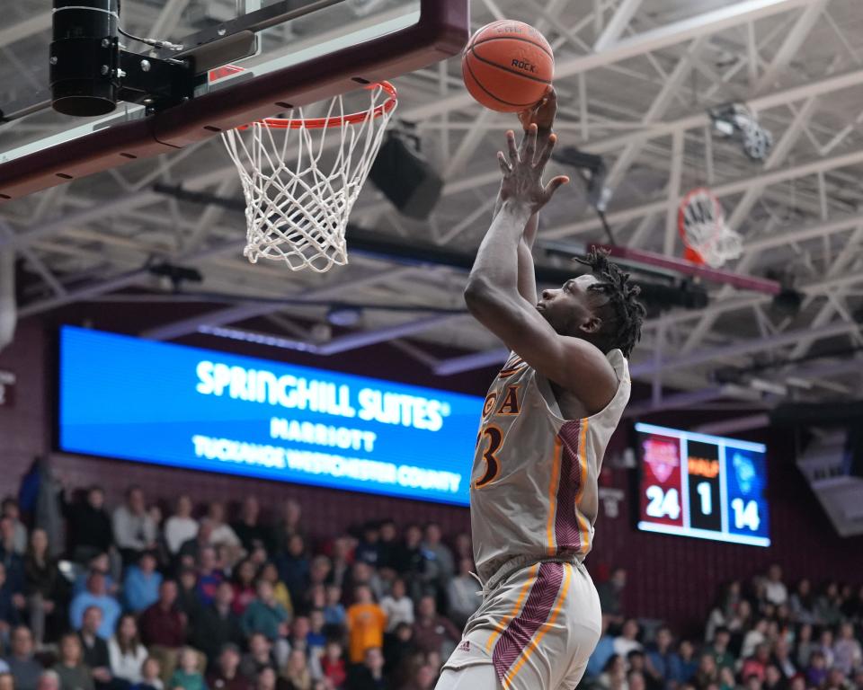 Nelly Junior Joseph had a 16-point, 14-rebound double-double in the win against Saint Peter's on Sunday, Jan. 1, 2022.