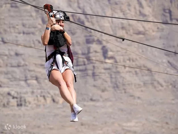 exotic travel destination - Jebel Jais zipline World's Longest zipline Experience from Dubai