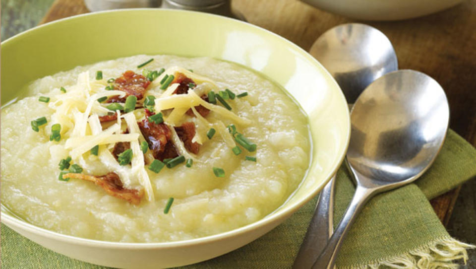 Potatoes, leeks, and spices are puréed into a creamy soup and topped with cheddar and bacon crumbles.