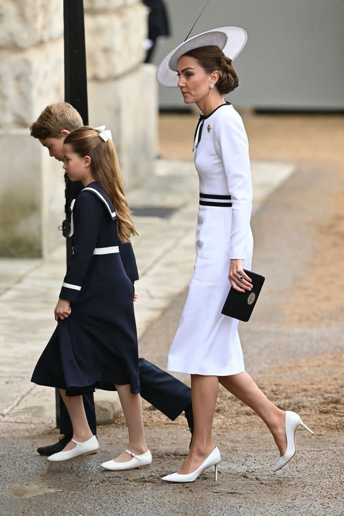 topshot britains catherine, princess of wales, arrives with britains princess charlotte of wales and britains prince george of wales to horse guards parade for the kings birthday parade trooping the colour in london on june 15, 2024 catherine, princess of wales, is making a tentative return to public life for the first time since being diagnosed with cancer, attending the trooping the colour military parade in central london photo by justin tallis afp photo by justin tallisafp via getty images