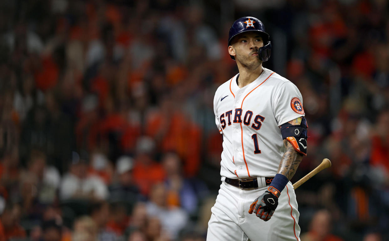 HOUSTON, TEXAS - NOVEMBER 02:  Carlos Correa #1 of the Houston Astros reacts after striking out against the Atlanta Braves during the first inning in Game Six of the World Series at Minute Maid Park on November 02, 2021 in Houston, Texas. (Photo by Elsa/Getty Images)