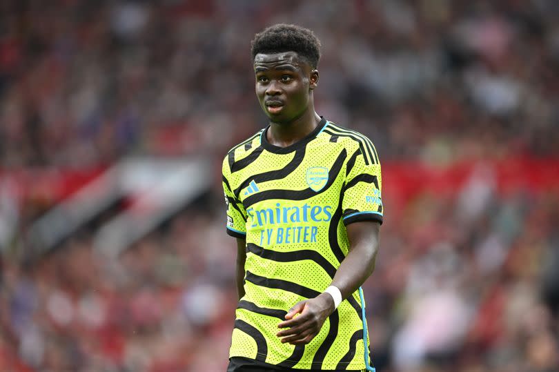 Bukayo Saka of Arsenal looks on during the Premier League match between Manchester United and Arsenal FC at Old Trafford on May 12, 2024 in Manchester, England.