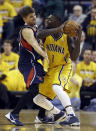 Indiana Pacers' Lance Stephenson (1) is defended by Atlanta Hawks' Kyle Korver during the first half in Game 1 of an opening-round NBA basketball playoff series on Saturday, April 19, 2014, in Indianapolis. (AP Photo/Darron Cummings)