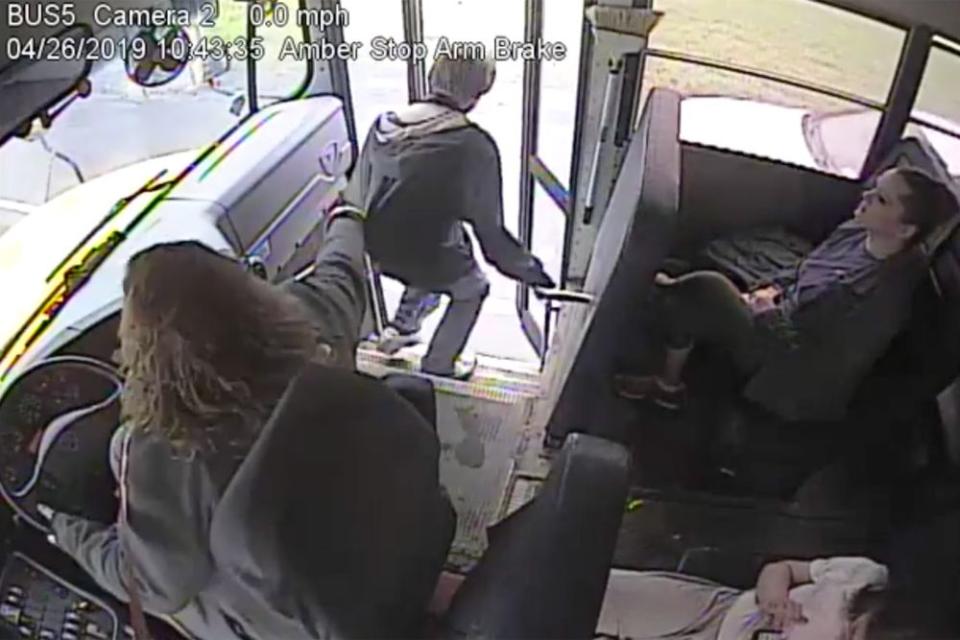 Bus Driver Stops Kid from Stepping in Front of Speeding Car