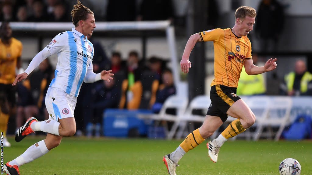 Harry Charsley of Newport County drives forward