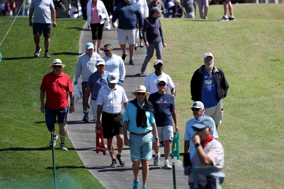 Fans follow Fred Couples during the pro-am day at Galleri Classic in Rancho Mirage, Calif., on Thursday, March 23, 2023.