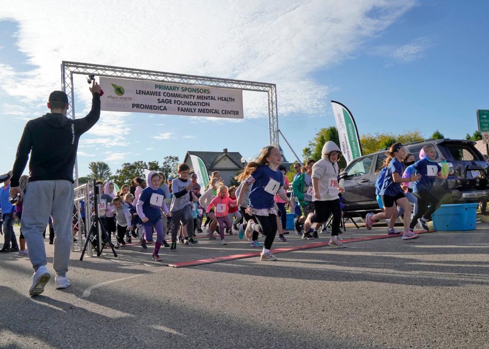 Plenty of youth take off from the start line Sept. 26, 2021, during the Lenawee Community Mental Health Authority's e-Race the Stigma 5K Run, Walk and Kids Dash held in downtown Adrian.