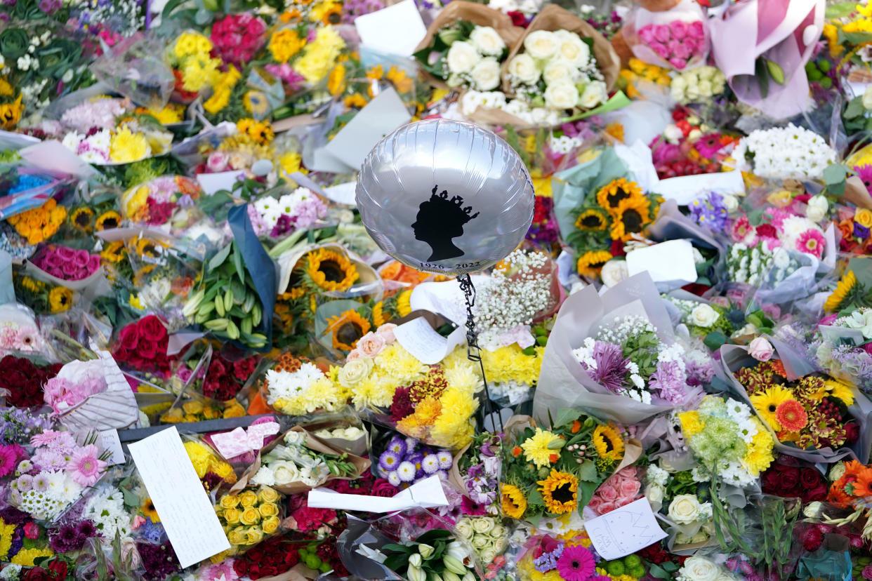 Piles of flowers can be seen at Buckingham Palace, London, following the death of Queen Elizabeth II