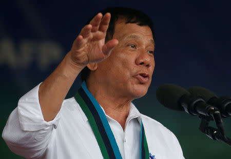 Philippine Pesident Rodrigo Duterte speaks during the change of command for the new Armed Forces chief at a military camp in Quezon city, Metro Manila, December 7, 2016. REUTERS/Erik De Castro