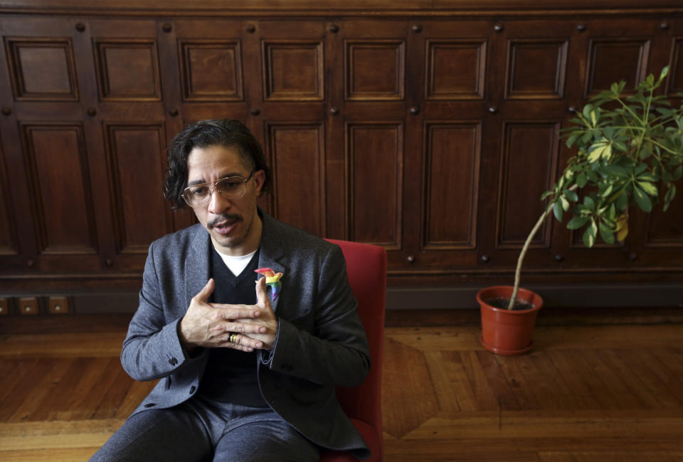 Brazilian self-exiled gay activist and former member of parliament Jean Wyllys gestures during an interview at the Portuguese parliament Wednesday, Feb. 27 2019. Wyllys was in Portugal invited to give two lectures and talk with Portuguese lawmakers about the situation of LGBT minorities in Brazil following the election of President Jair Bolsonaro. After the presidential election Wyllys left Brazil where he was living under protection following continuous death threats.(AP Photo/Armando Franca)