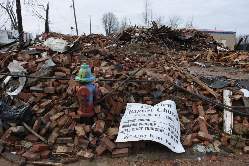 The remnants of the Fairview Baptist Church sit on the corner of West Water Street and West South Street in Mayfield, Ky., on Sunday, Jan 9, 2022. The Rev. Leroy Brent, pastor for 33 years at Fairview Baptist, a predominantly Black congregation affiliated with the Southern Baptist Convention, recalled his shock at the devastation the tornado left around the church. “I could stand on the steps that I would normally stand on every Sunday, and I didn’t know where I was,” he said. “There were no landmarks.” (AP Photo/Audrey Jackson)