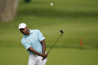 Wyatt Worthington II chips to the green on the third hole during a practice round for the PGA Championship golf tournament, Tuesday, May 17, 2022, in Tulsa, Okla. (AP Photo/Eric Gay)