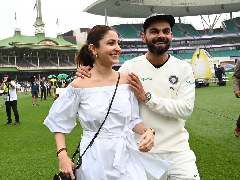 File photo: Actor Anushka Sharma and her husband, Indian cricketer Virat Kohli at the Sydney Cricket Ground in 2019  (AFP via Getty Images)