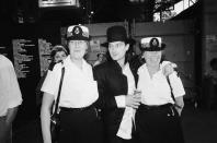 <p>At the same 1985 Live Aid concert at Wembley Stadium, two lucky (and notably ecstatic) police officers are treated to a photograph with U2's Bono. </p>