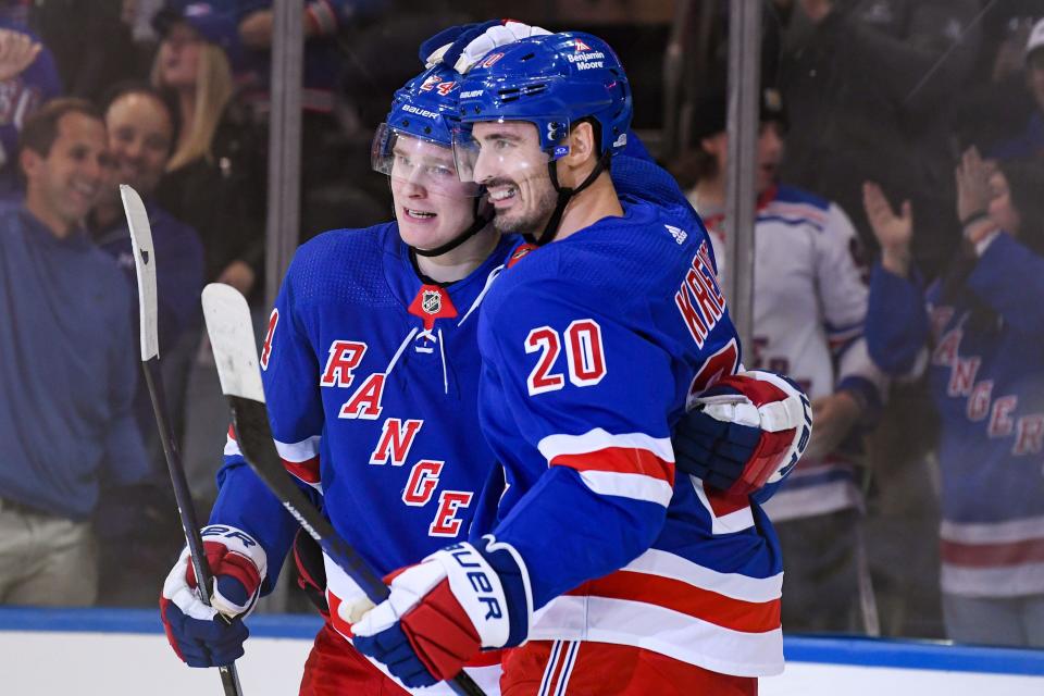 Oct 5, 2023; New York, New York, USA; New York Rangers right wing Kaapo Kakko (24) celebrates his goal with New York Rangers left wing Chris Kreider (20) against the Boston Bruins during the first period at Madison Square Garden. Mandatory Credit: Dennis Schneidler-USA TODAY Sports ORG XMIT: IMAGN-713856 ORIG FILE ID: 20231005_ams_si5_0071.JPG