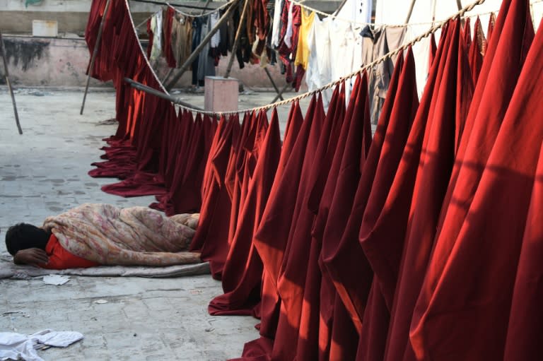 Younger generations are not keen on working in New Delhi's open-air laundries because of the long hours, hard work and low pay