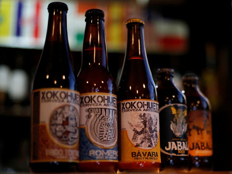 Xokohuetzi and Jabali craft beers are displayed in a bar in Mexico City