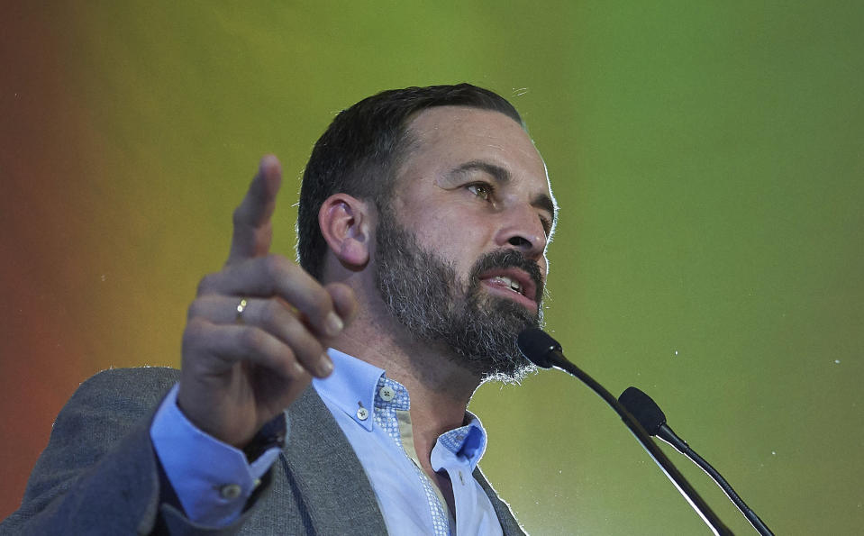 In this Sunday, Dec. 2, 2018 photo, Spain's far-right Vox Party President Santiago Abascal, takes part in a rally during regional elections in Andalusia, in Seville, Spain. The Socialists won just 33 seats in the Andalusia legislature, compared to 47 in 2015. The party could lose control of Spain's most populated region for the first time in 36 years if parties on the right can agree to form a government. The anti-immigrant, extreme right Vox party won 12 seats - its first in any Spanish legislative body. (AP Photo/Gogo Lobato)