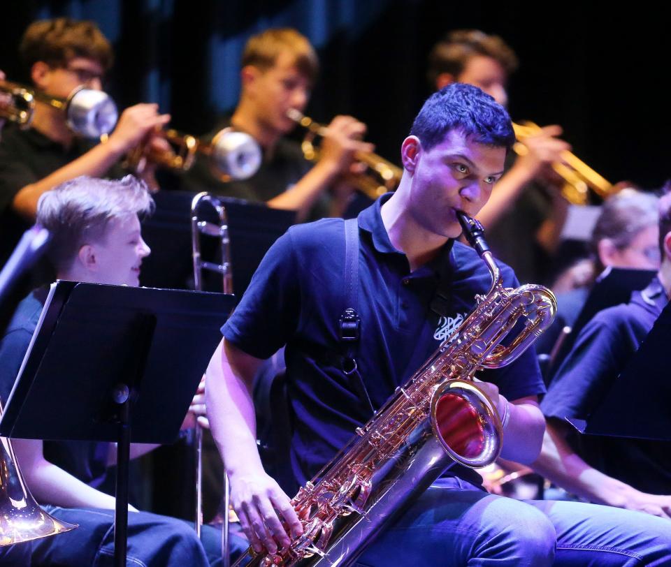 Finn-Luca Palmer plays baritone sax with the Max Planck Gymnasium Big Band, a group of high school aged students from Schorndorf, Germany, as they perform for students at Paul Bryant High in Cottondale Monday, Oct. 16, 2023. The visit is part of the Sister Cities program.