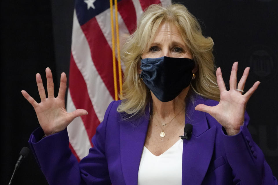 First lady Jill Biden, gestures as she speaks during a visit to the Massey Cancer center at Virginia Commonwealth University for a discussion about cancer disparities. in Richmond, Va., Wednesday, Feb. 24, 2021. (AP Photo/Steve Helber)