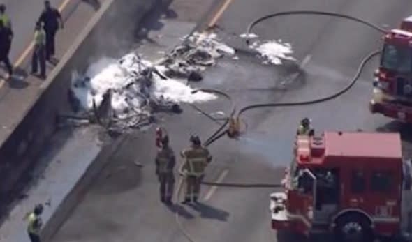 4 dead as plane crashes onto highway in Atlanta